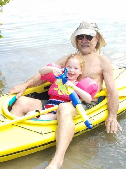 Teaching a grand daughter that a kayak bilge pump can be a "Super-Soaker"