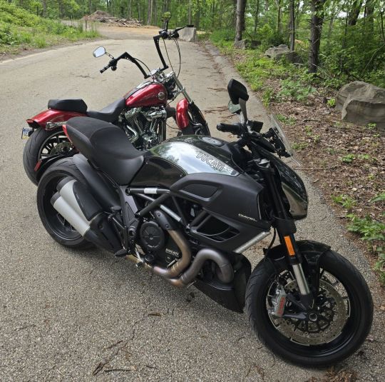 The Black and Chrome Ducati is mine.... the Harley is a friends.