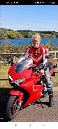 Me and my other Love! My Honda VFR800 Motorbike. Would you like a gentle Ride as my passenger? Let's explore England together!