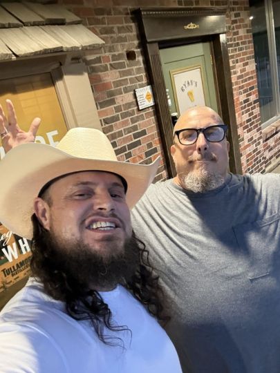 Me and dear friend out shooting pool I’m definitely rocking the straw hat and long hair