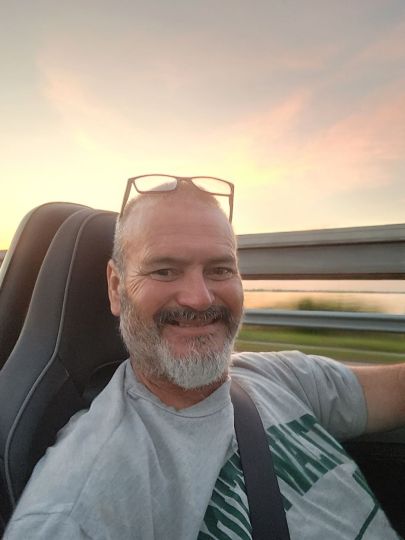 Running down the road in my miata.