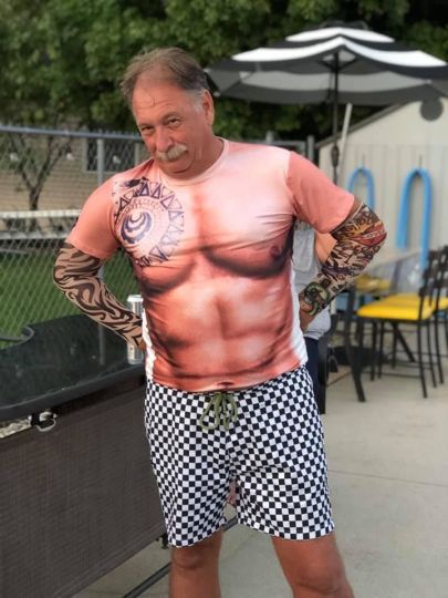 Yap, that is a T-shirt and fake tattoos