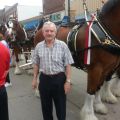 Budweiser Team delivering beer cases to pups there on city days.