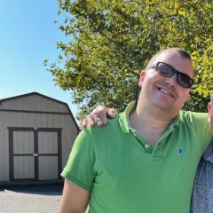 Green Polo next to my bald father in Rhode Island