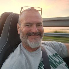 Running down the road in my miata.